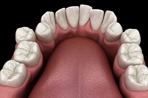 Woman smiling while working on laptop at home