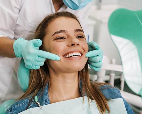 patient smiling in the dental chair