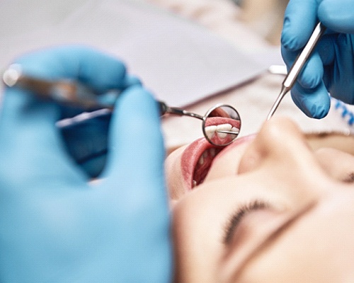 woman getting dental crowns in Bedford