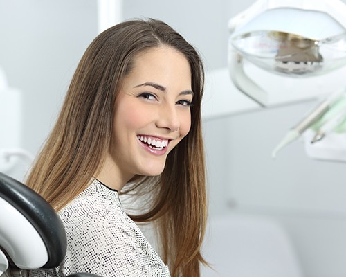 Smiling woman in dental chair