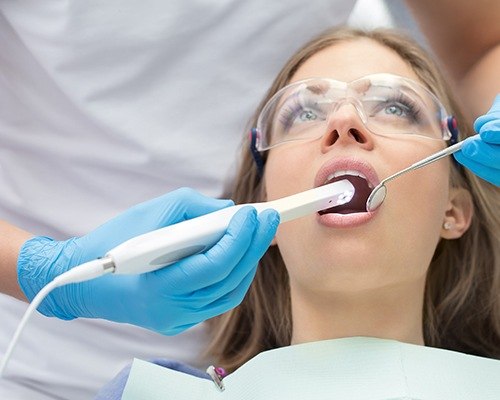 Dentist capturing intraoral images