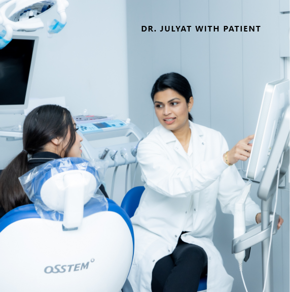 doctor showing patient a smile