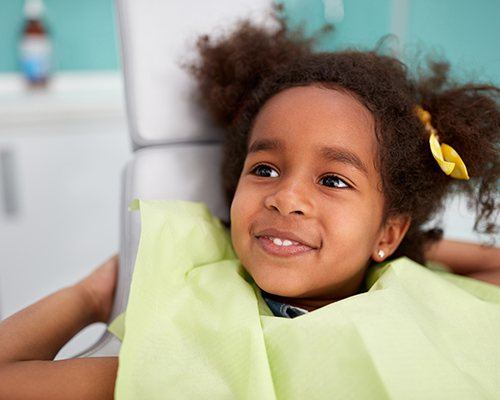 Little girl smiling during children's dentistry visit