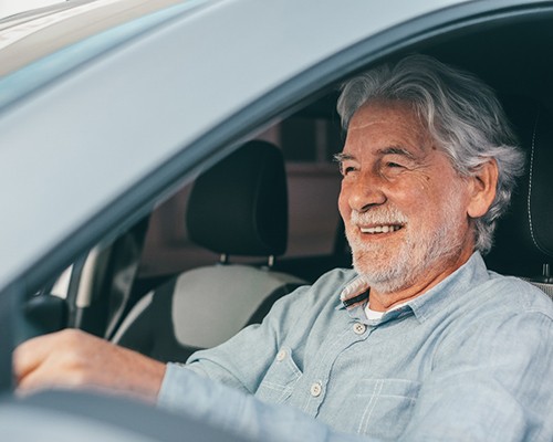 satisfied man after root canal therapy in Bedford