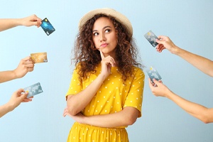 Woman surrounded by credit cards