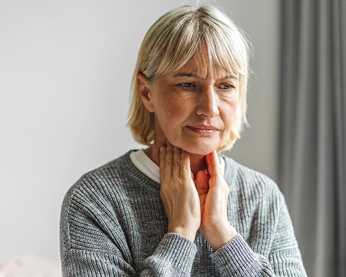 Woman with a sore throat