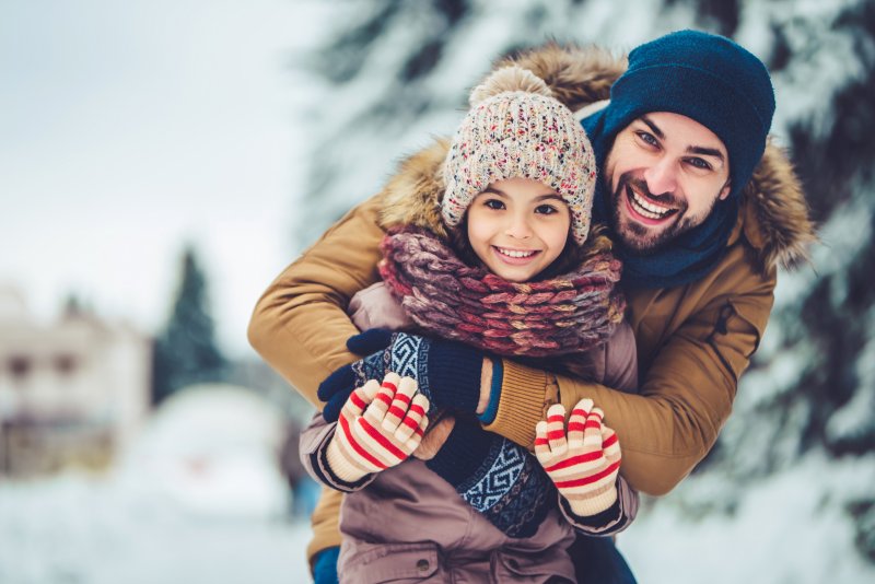 a man smiling with Invisalign in Bedford